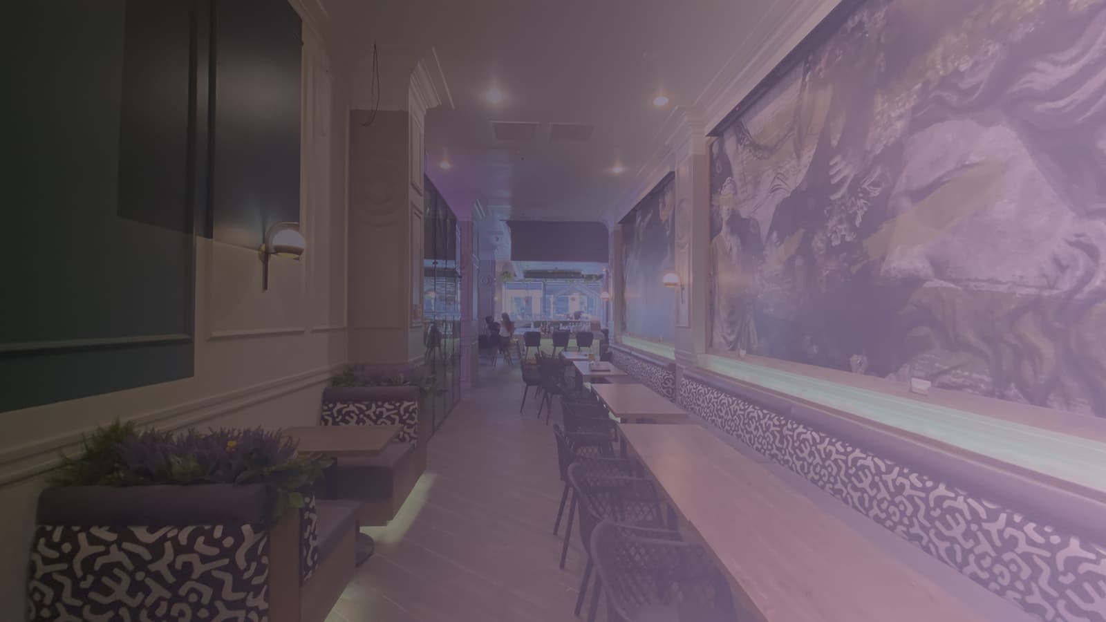 Salvatore's lounge — a low-lit back room with neon, leopard banquettes, marble bar and signature cocktails